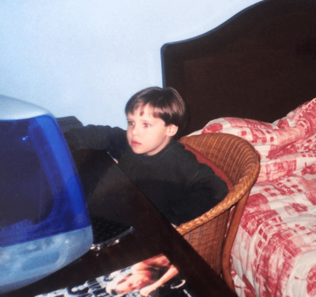 Me using an iMac G3 back in the day.